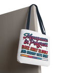 Menopause in Progress tote bag with cheeky design, durable spun polyester, three sizes, and multiple handle colors