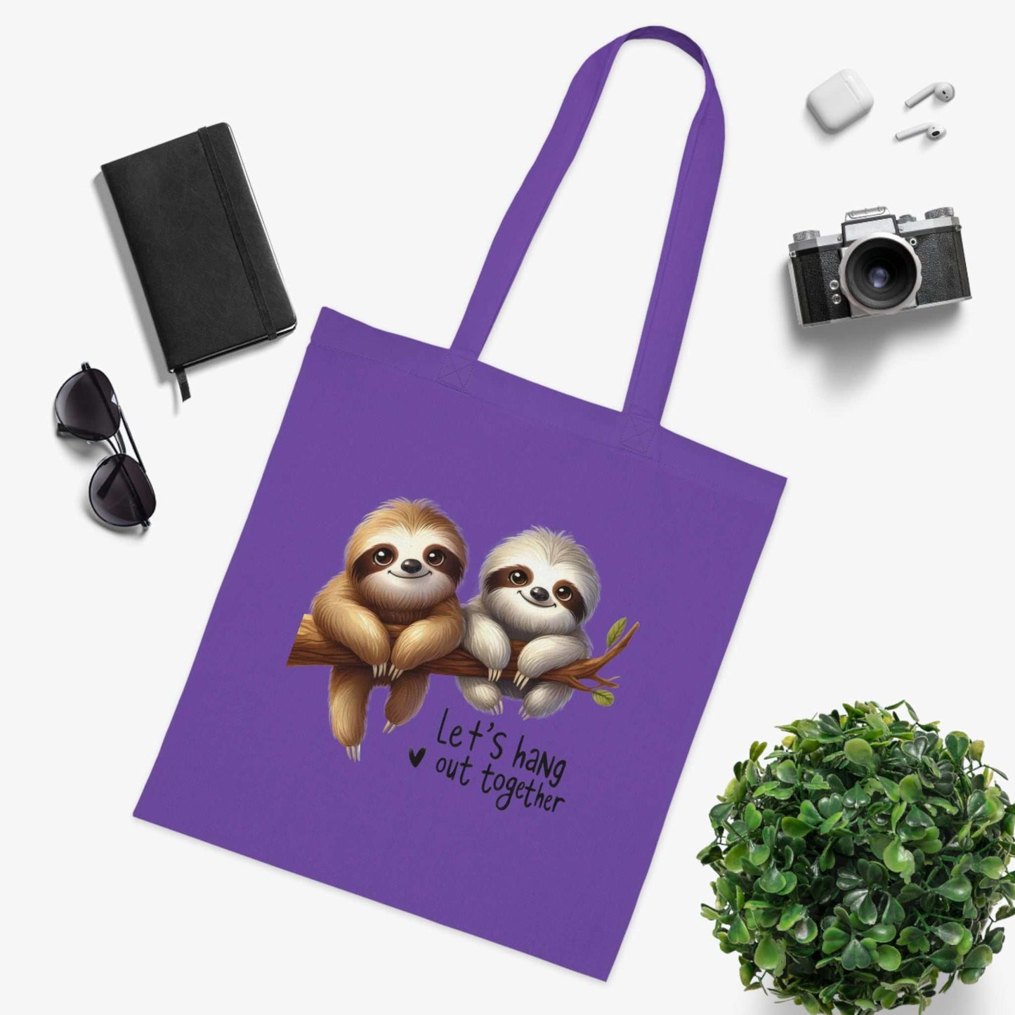 Cotton tote bag with cute sloth design, perfect for style and durability.