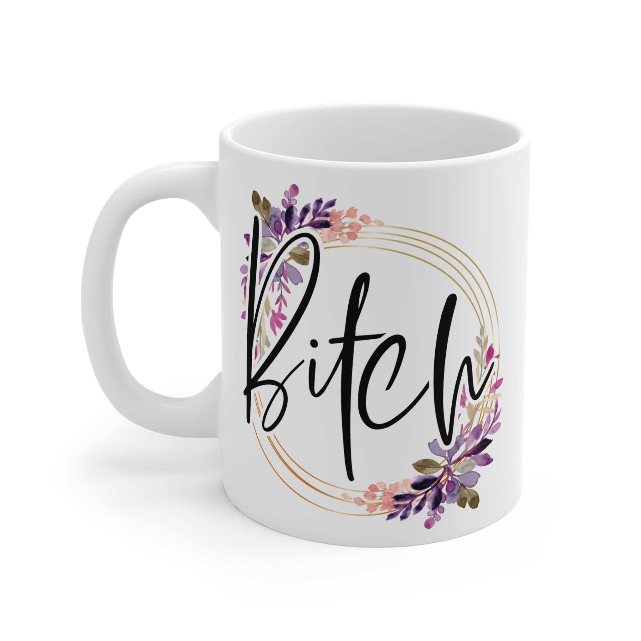 White ceramic mug with "Bitch" text in black script surrounded by a floral wreath, glossy finish, 11oz, microwave and dishwasher safe