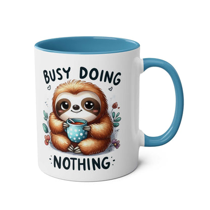 Cute sloth coffee mug with whimsical design, perfect for animal lovers; 11oz ceramic, glossy finish, dishwasher and microwave safe.