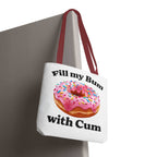 Provocative Donut Tote Bag with cheeky design, durable spun polyester, multiple sizes and handle colors, perfect for everyday use.