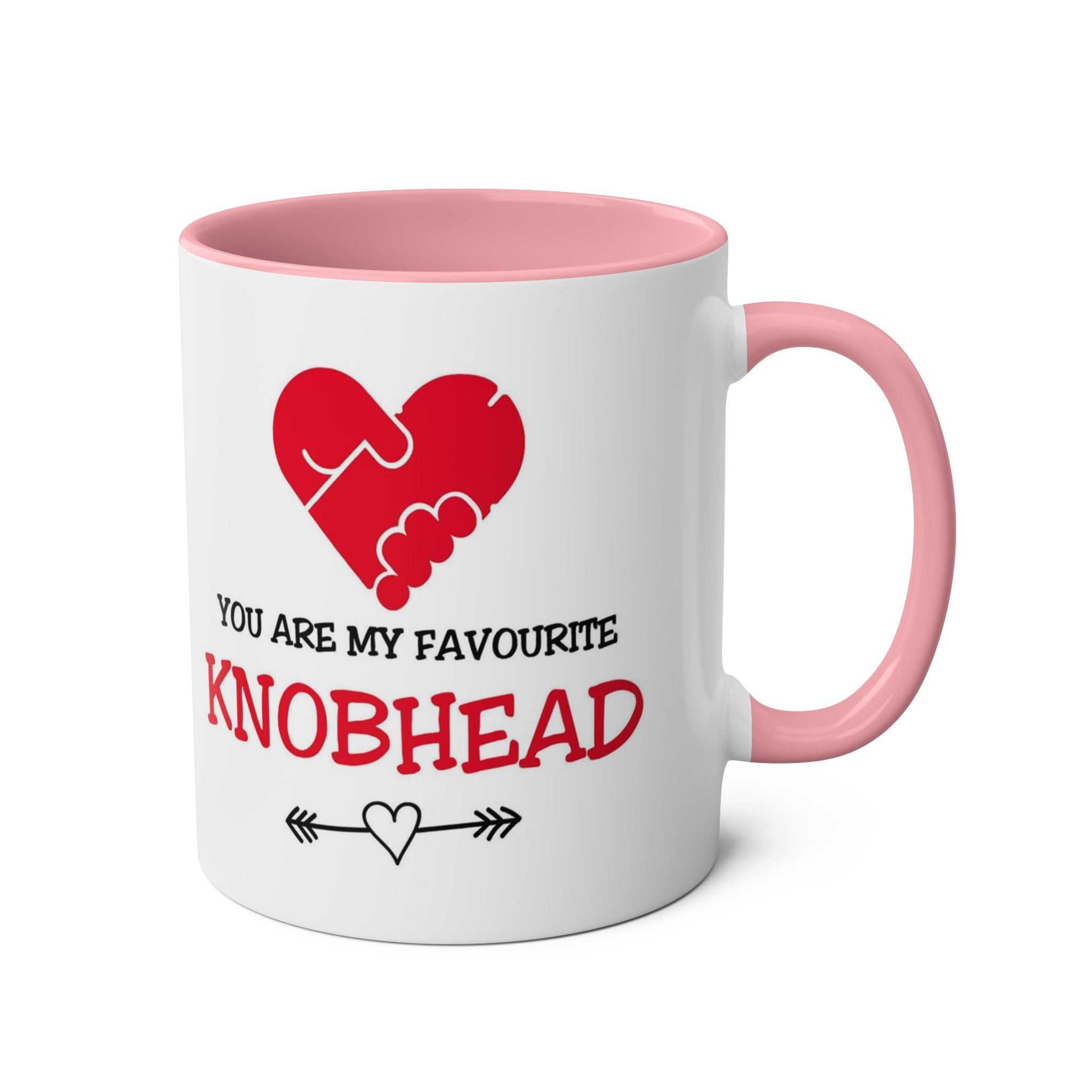 White ceramic Favourite Knobhead Mug with pink handle and inside, featuring red heart graphic and cheeky Valentine’s Day message