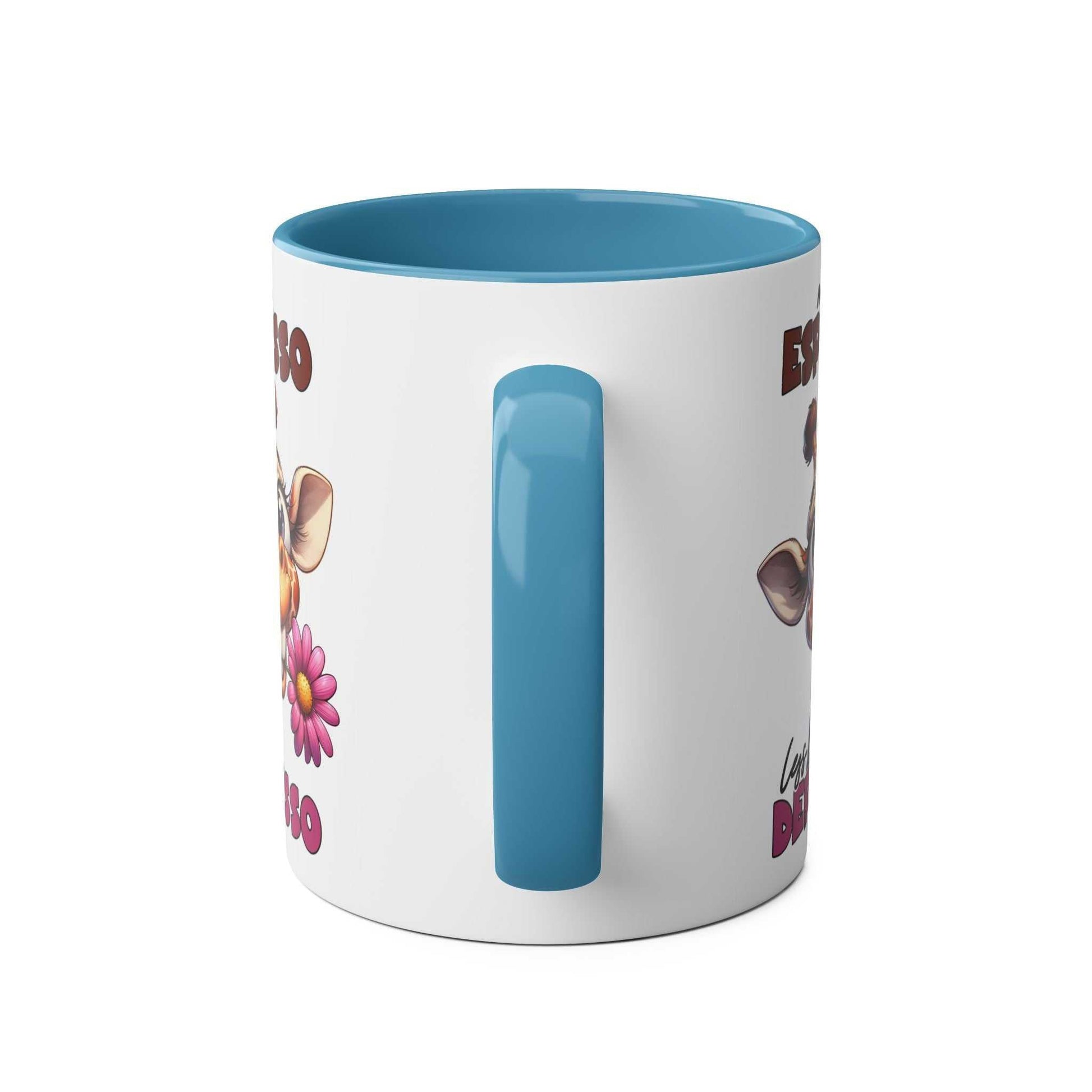 More Expresso Coffee Mug with a giraffe design and blue handle.