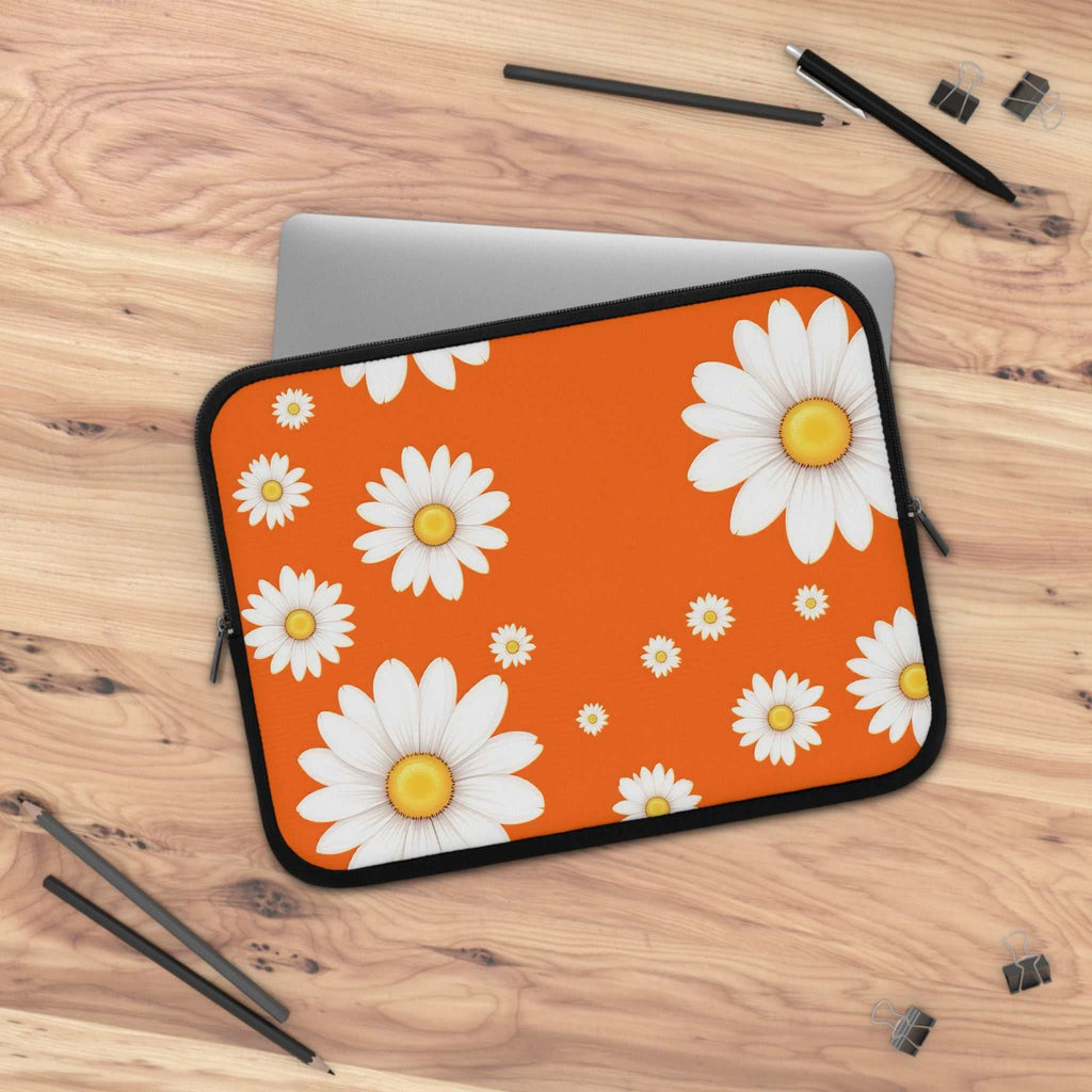 Orange laptop sleeve with white daisy pattern, neoprene protective cover for laptops, lightweight and waterproof with dual zipper closure