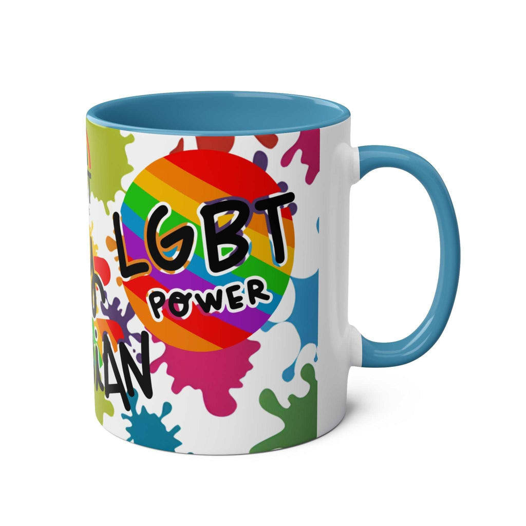 Vibrant LGBTQ+ Pride mug with rainbow design and blue handle.