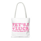 Pink heart tote bag with cheeky fun design and colorful handles