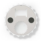 Metal bottle opener with dual-opening mechanisms and magnetic backing in a bottle cap shape