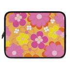 Retro floral laptop sleeve in bright pink, yellow, and orange flowers with black trim, durable neoprene and dual zipper closure