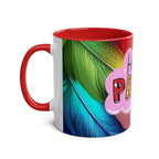 LGBTQ+ Pride ceramic mug with vibrant rainbow design and red interior.