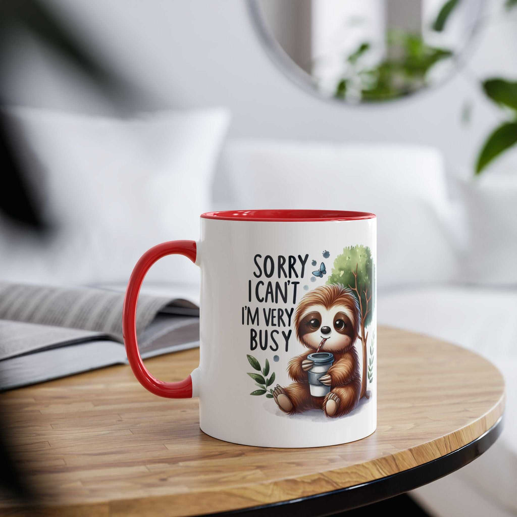 Cute sloth coffee mug with red handle, whimsical design, perfect for animal lovers.
