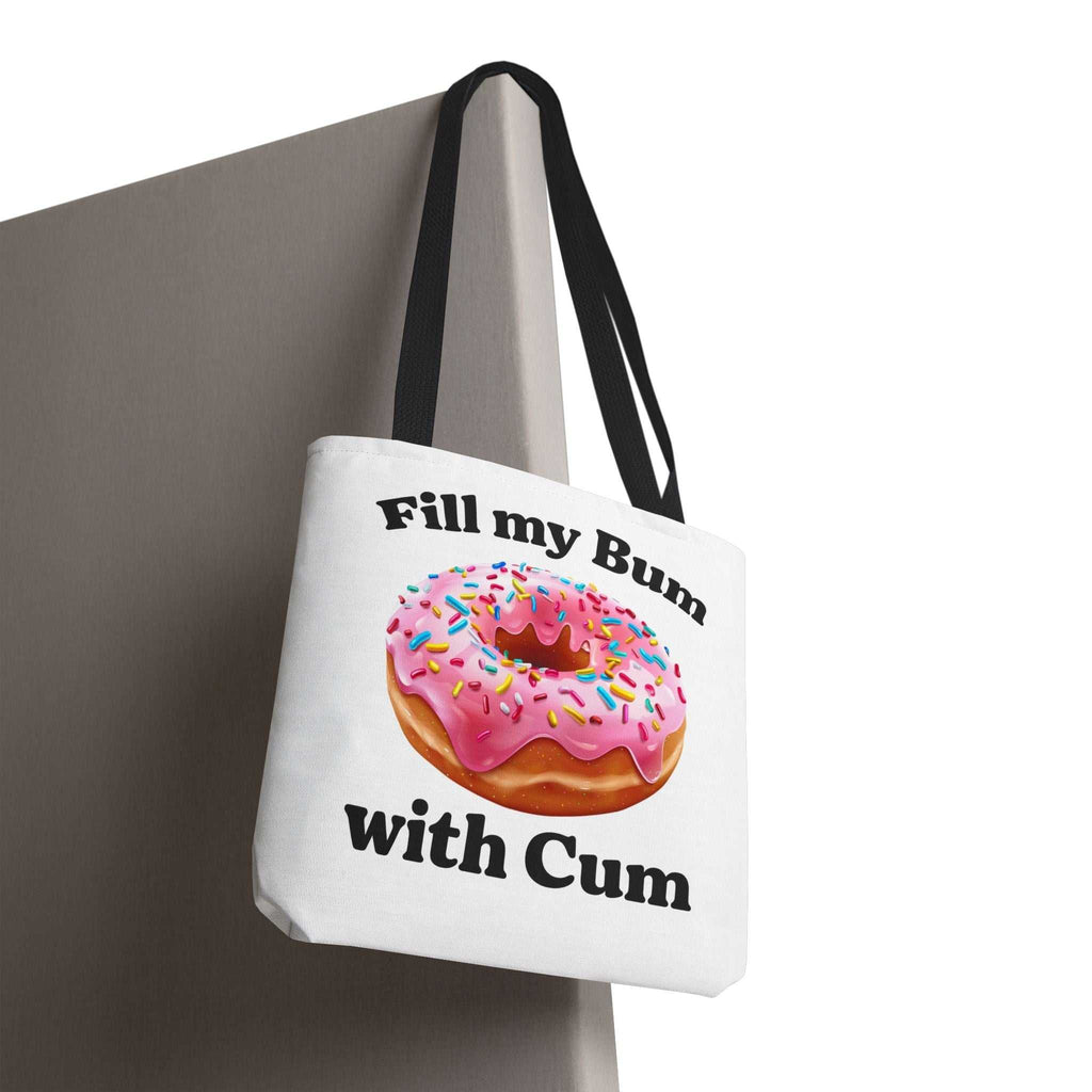 Provocative Donut Tote Bag with cheeky design, durable spun polyester, multiple sizes and handle colors.