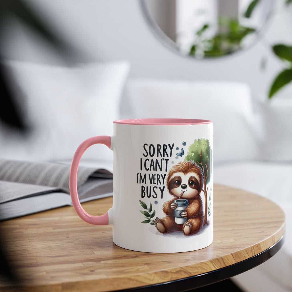 Cute sloth coffee mug with whimsical design on a cozy table setting.