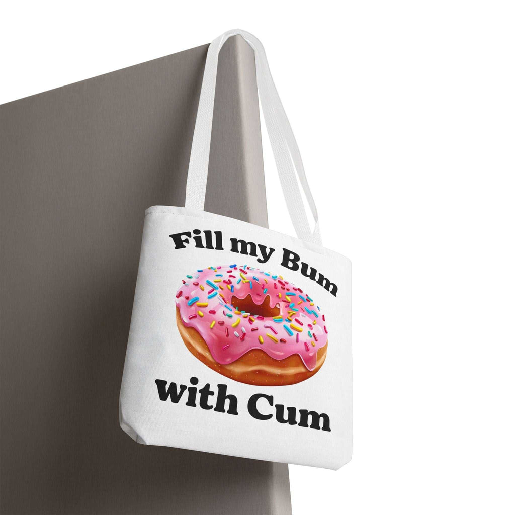 Provocative Donut Tote Bag with cheeky design, durable spun polyester, multiple sizes and handle color options for fun everyday use