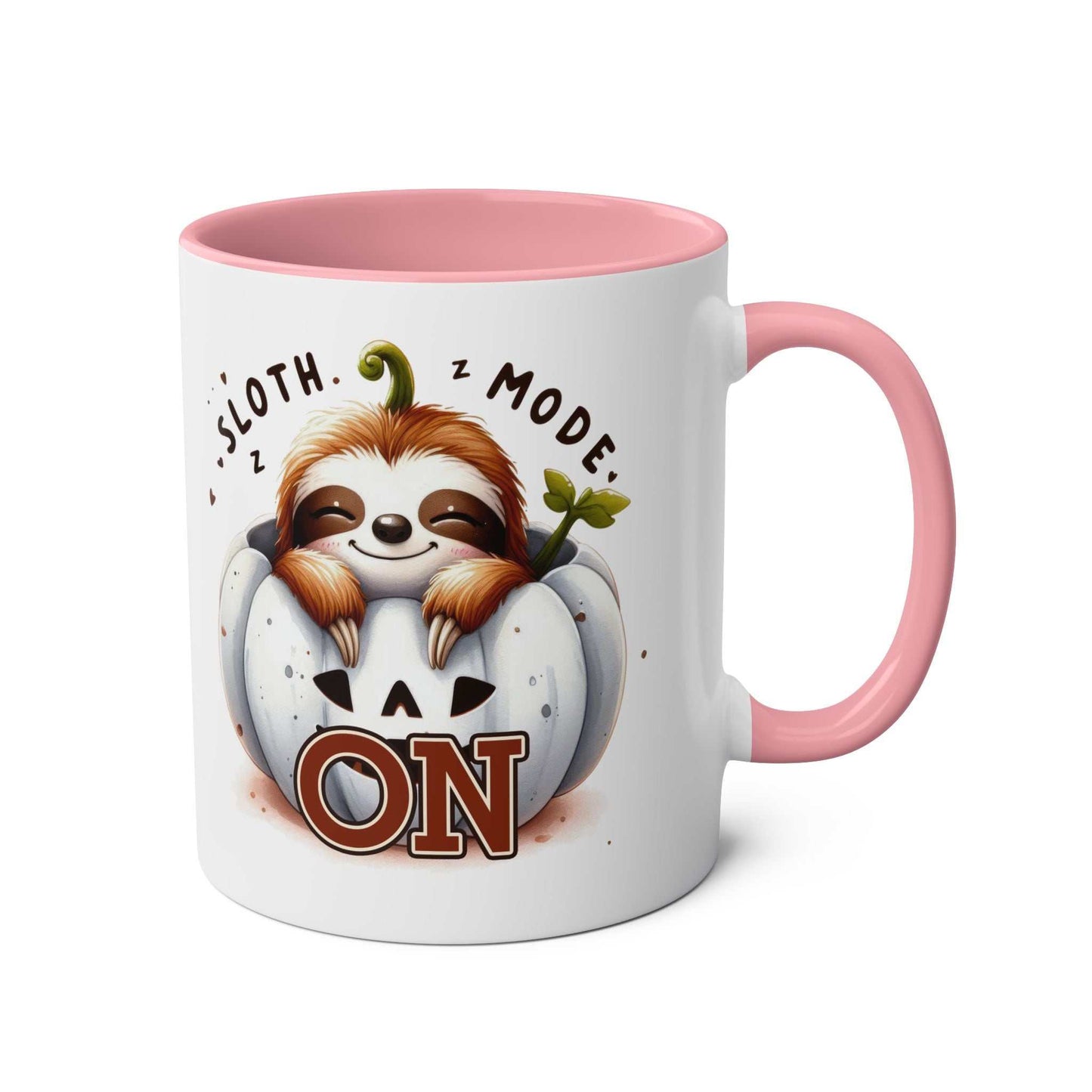 Cute sloth coffee mug with pink handle and interior, featuring a cozy sloth design.