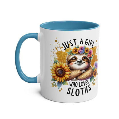Cute sloth coffee mug with floral design and colorful handle - perfect for sloth enthusiasts.