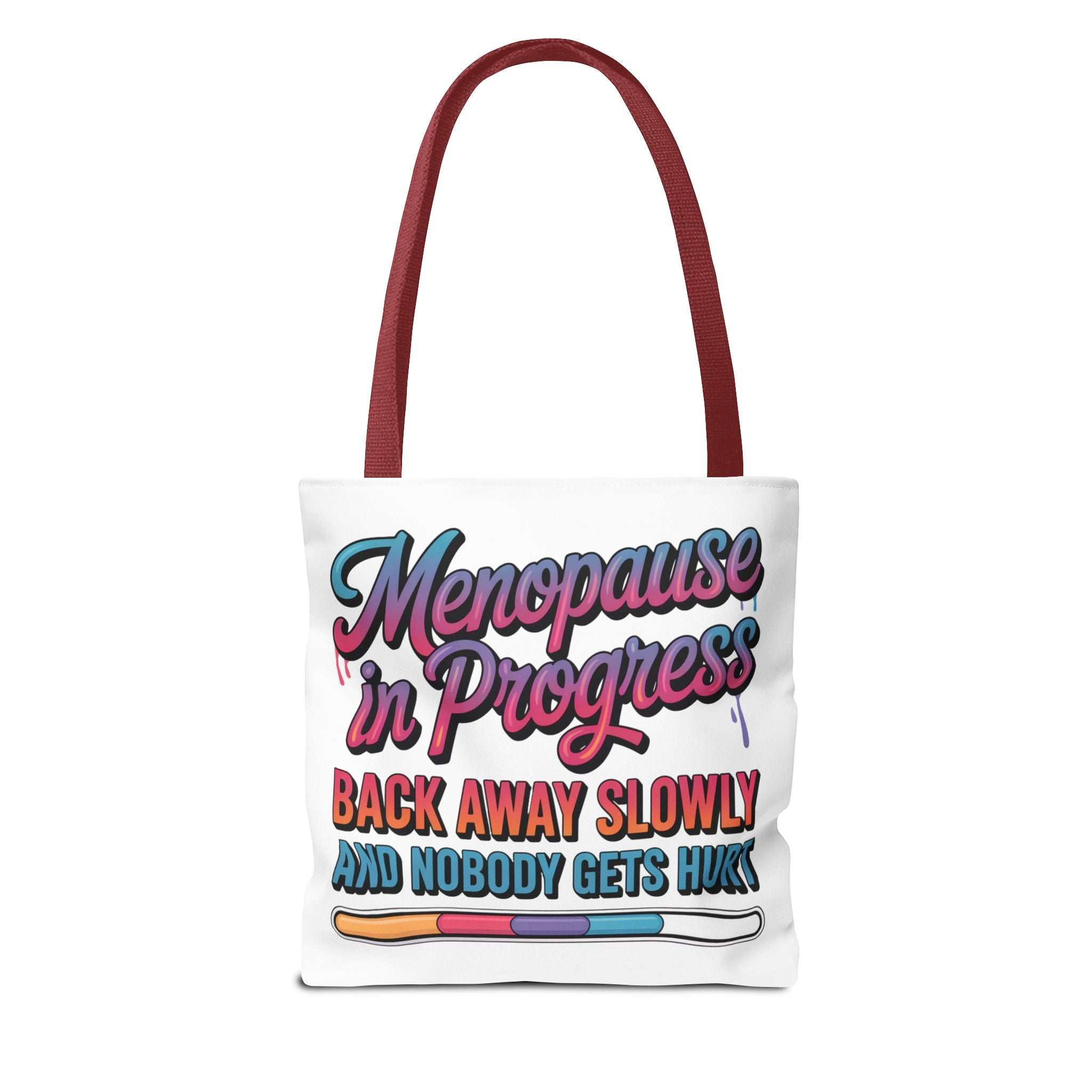 Menopause in Progress tote bag with cheeky design and multiple handle color options, durable spun polyester, available in three sizes