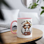 Cute sloth coffee mug with whimsical design on a wooden table.
