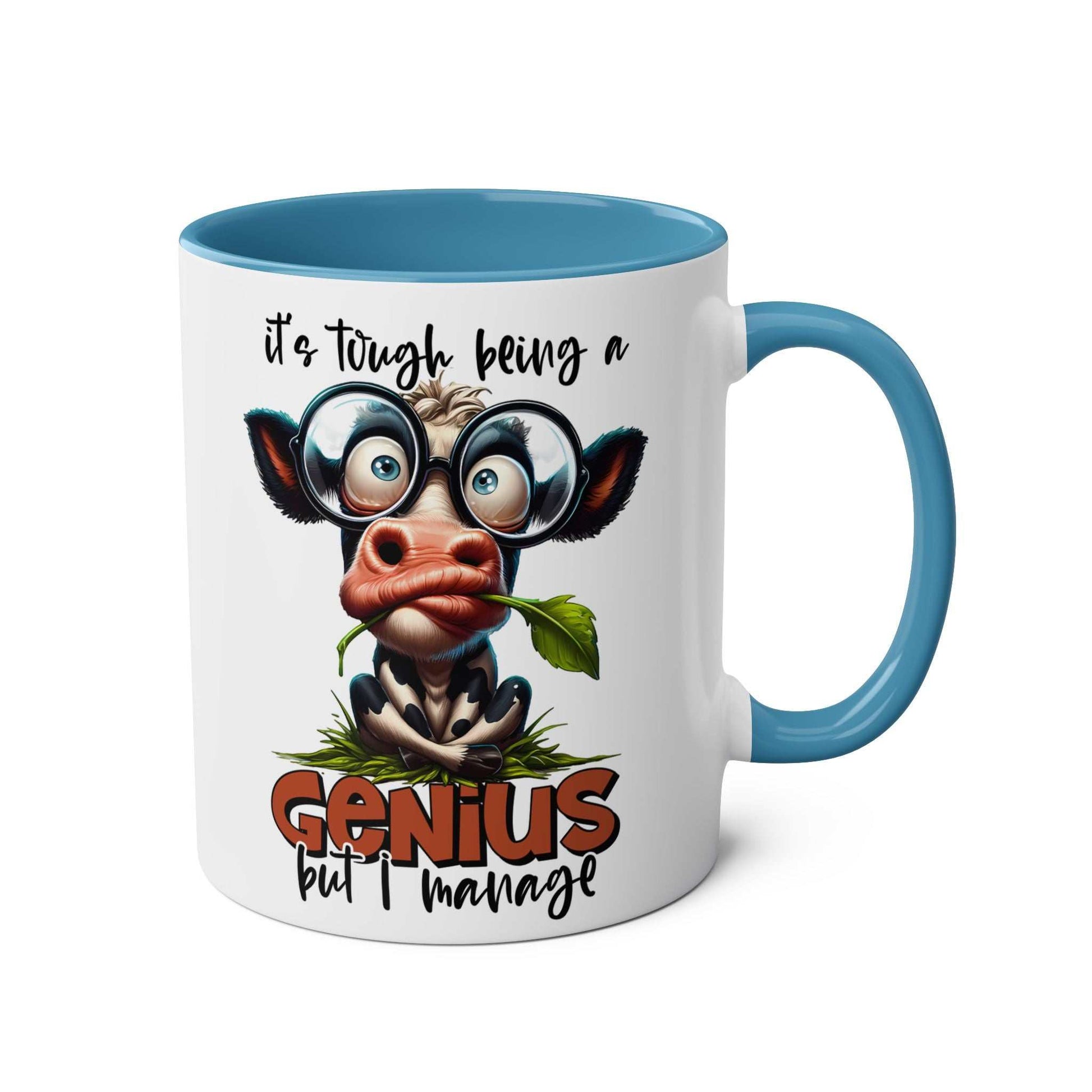 Funny cow design on Genius Coffee Mug with blue interior and handle.