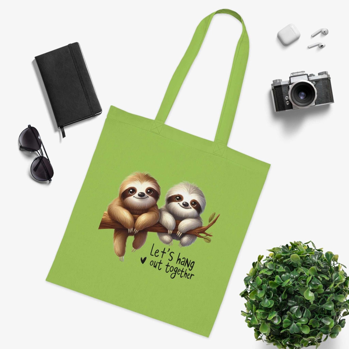 Cotton tote with cute sloth design, vibrant colors, and durable 100% cotton fabric.