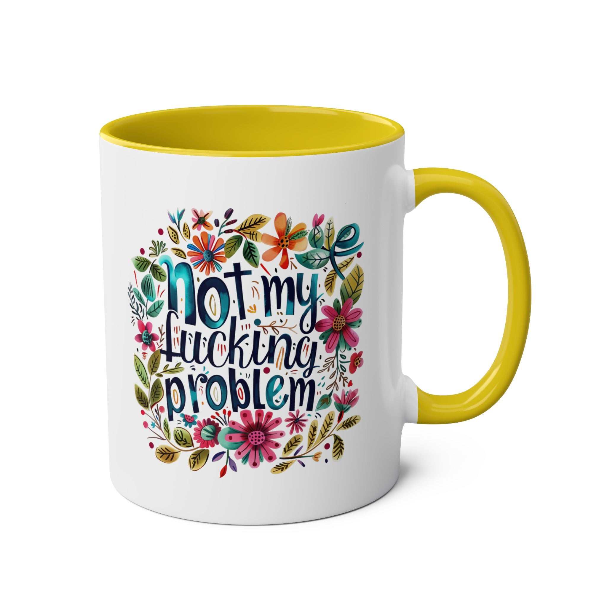 Cheeky "Not My Problem" coffee mug with floral design and yellow interior.