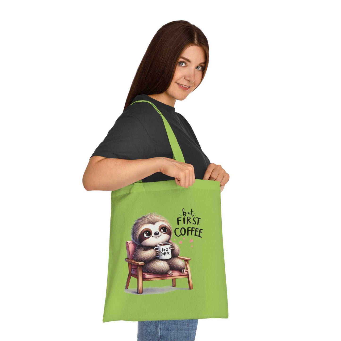 Cotton tote bag with cute sloth design, perfect for shopping, features vibrant colors and reinforced handles.