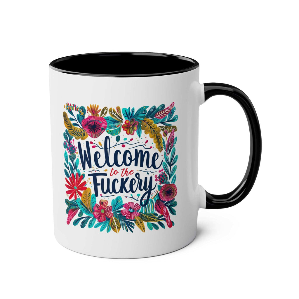 Colorful "Welcome to the Fuckery" coffee mug with floral design and black handle.