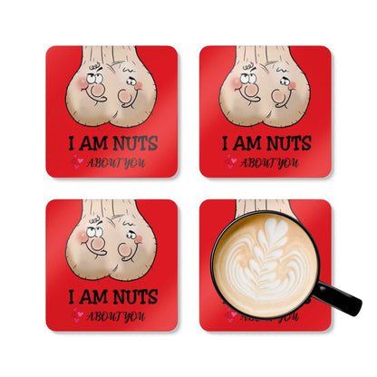 Cheeky I Am Nuts About You coaster set with humorous design, perfect for adding fun to any table setting, includes four MDF coasters with cork backing.