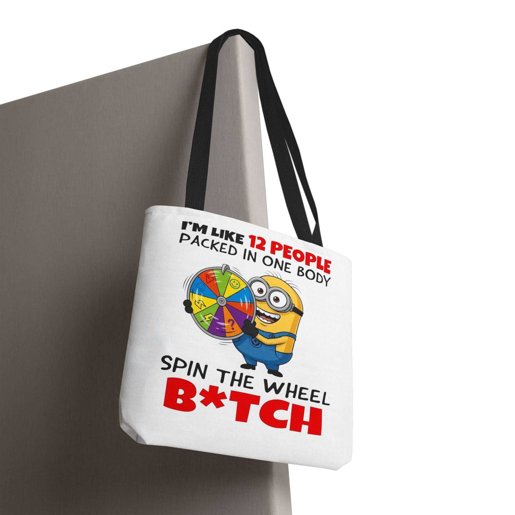 Funny Minion tote bag with cheeky design, durable spun polyester, and colorful handles.