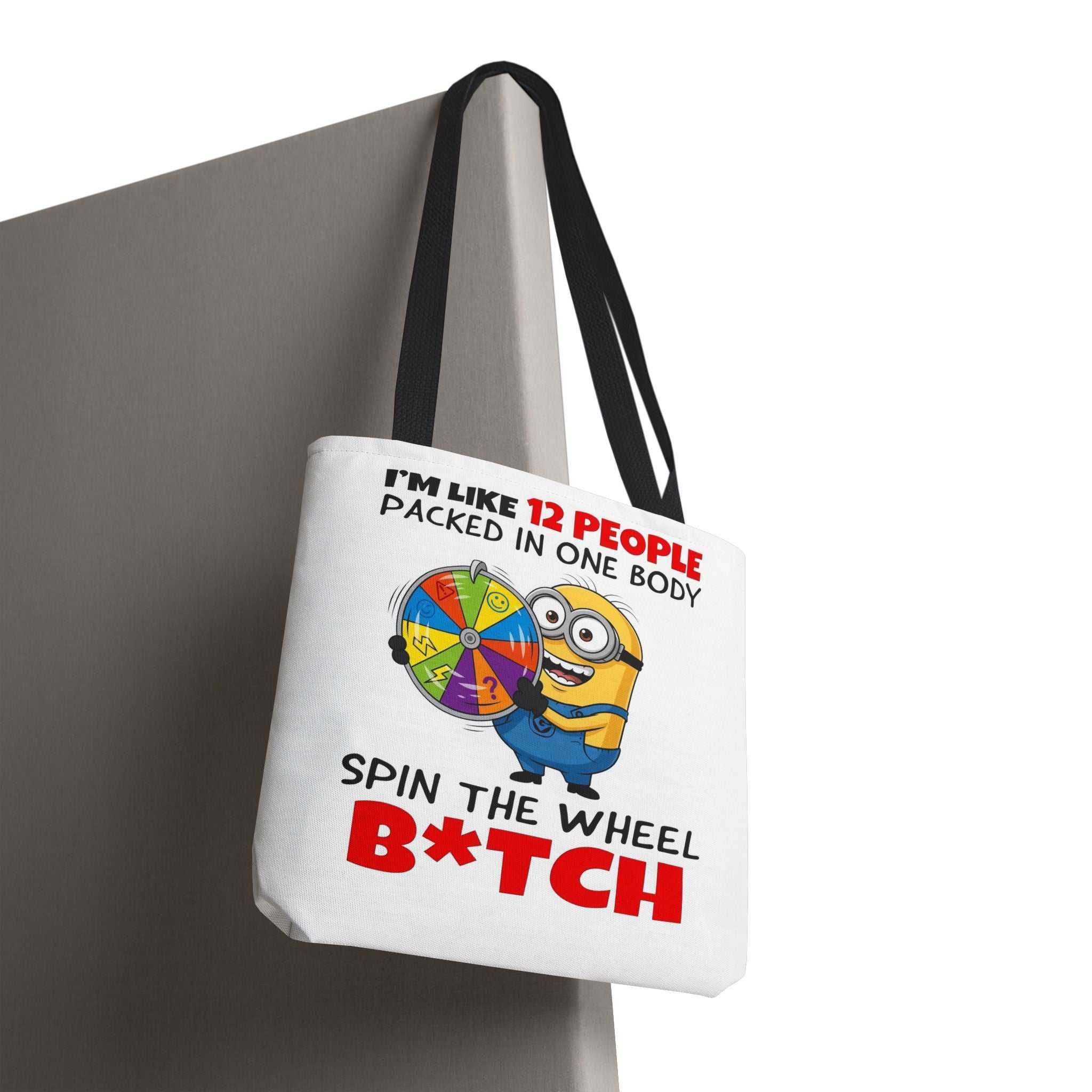 Funny Minion tote bag with cheeky design, durable spun polyester, and colorful handles.
