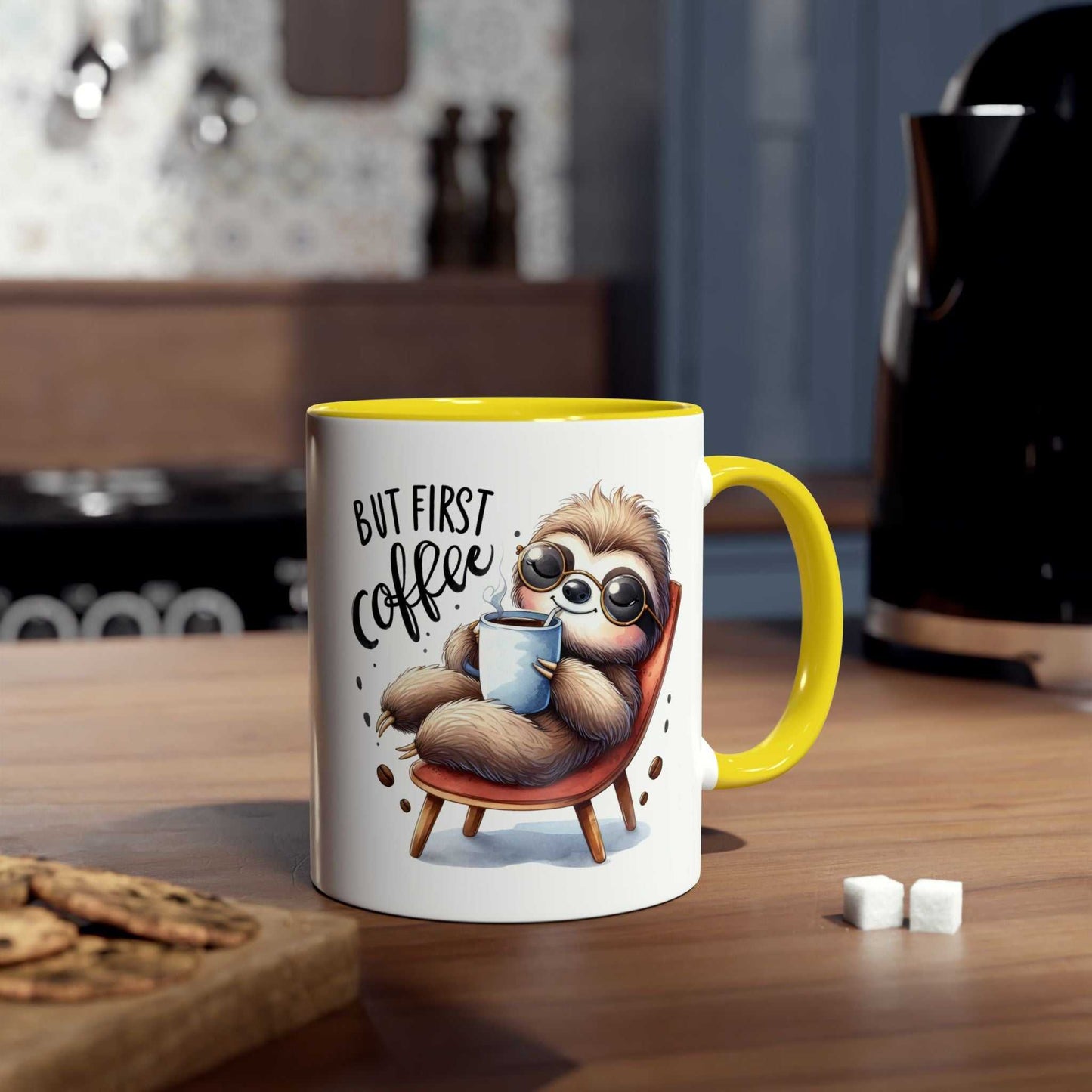 Cute sloth coffee mug with whimsical design, yellow handle, in a cozy kitchen setting.