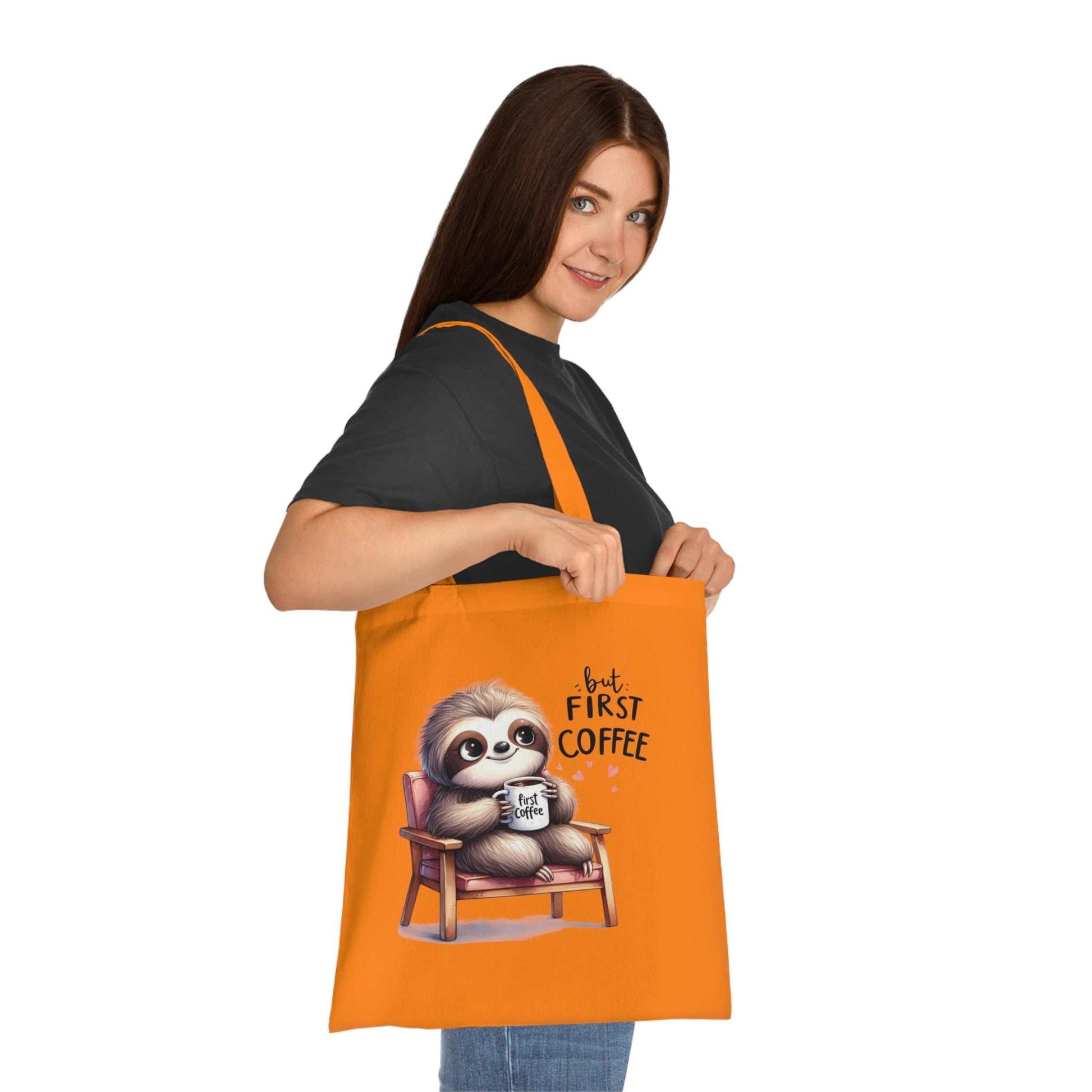 Cotton tote bag with cute sloth design in vibrant colors, perfect for everyday use.