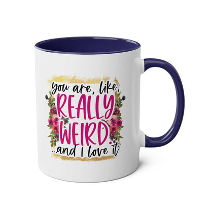 Really Weird Coffee Mug with humorous text and floral design.