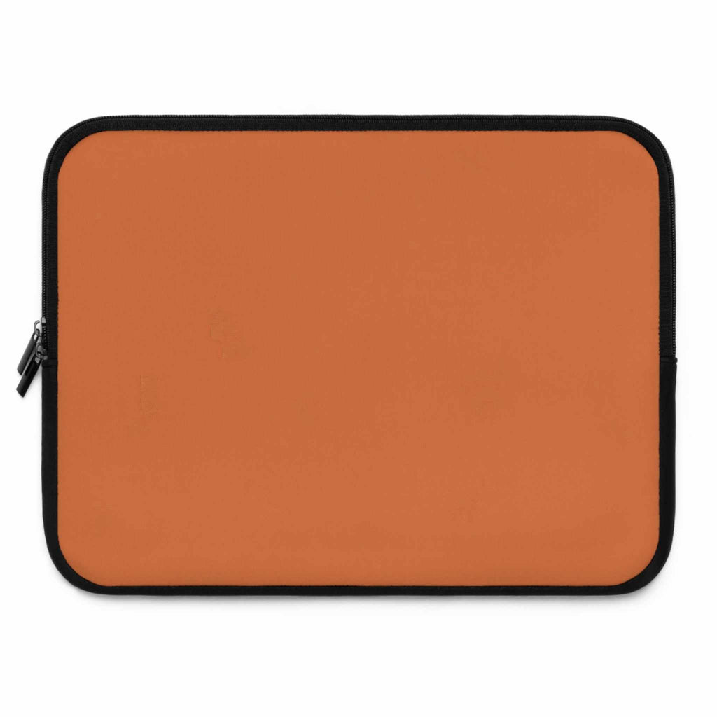 Bold orange laptop sleeve made of durable neoprene with soft foam lining and dual zipper closure.