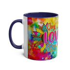 Vibrant rainbow LGBTQ+ Pride mug with "Joy Love Bliss" design, ceramic and glossy finish.