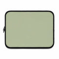 Sage green neoprene laptop sleeve with soft foam lining and dual zipper closure