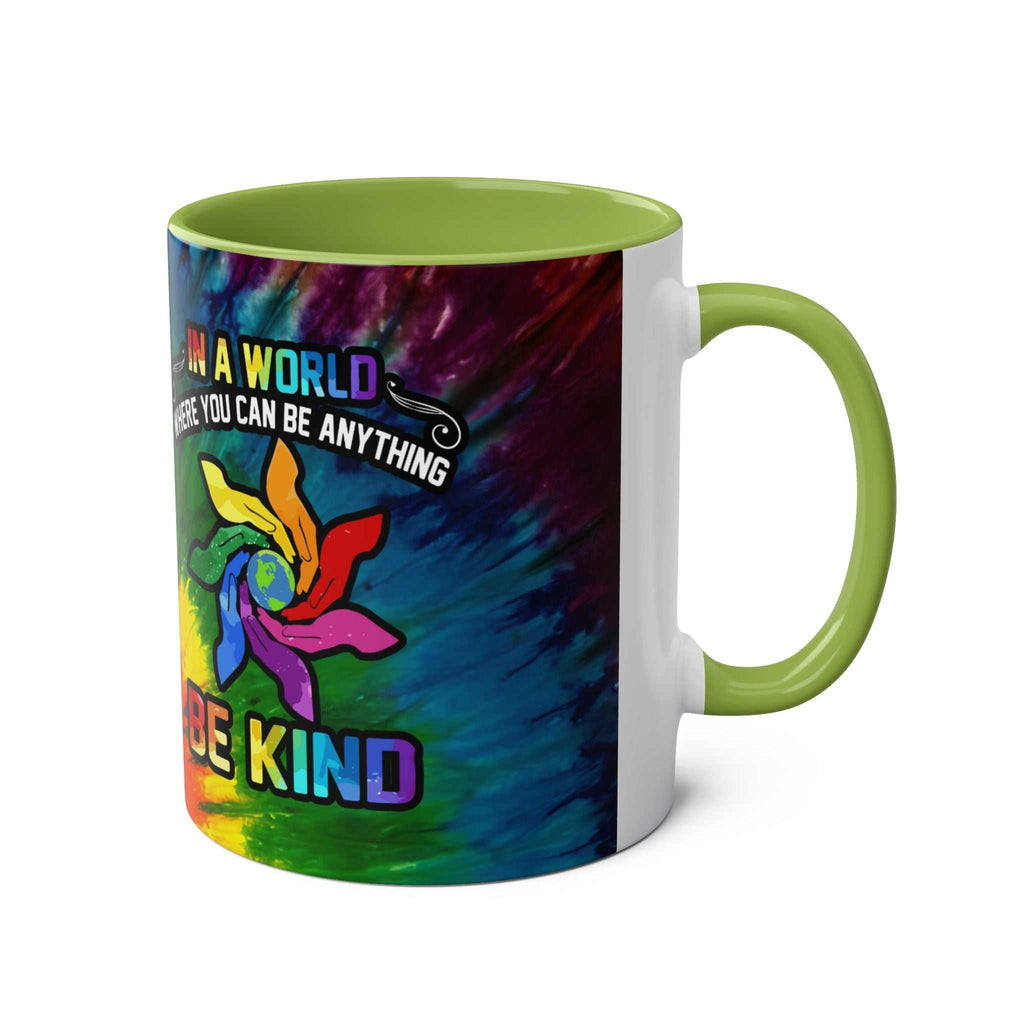LGBTQ+ Pride mug with vibrant rainbow design and "Be Kind" message, ceramic, 11oz.