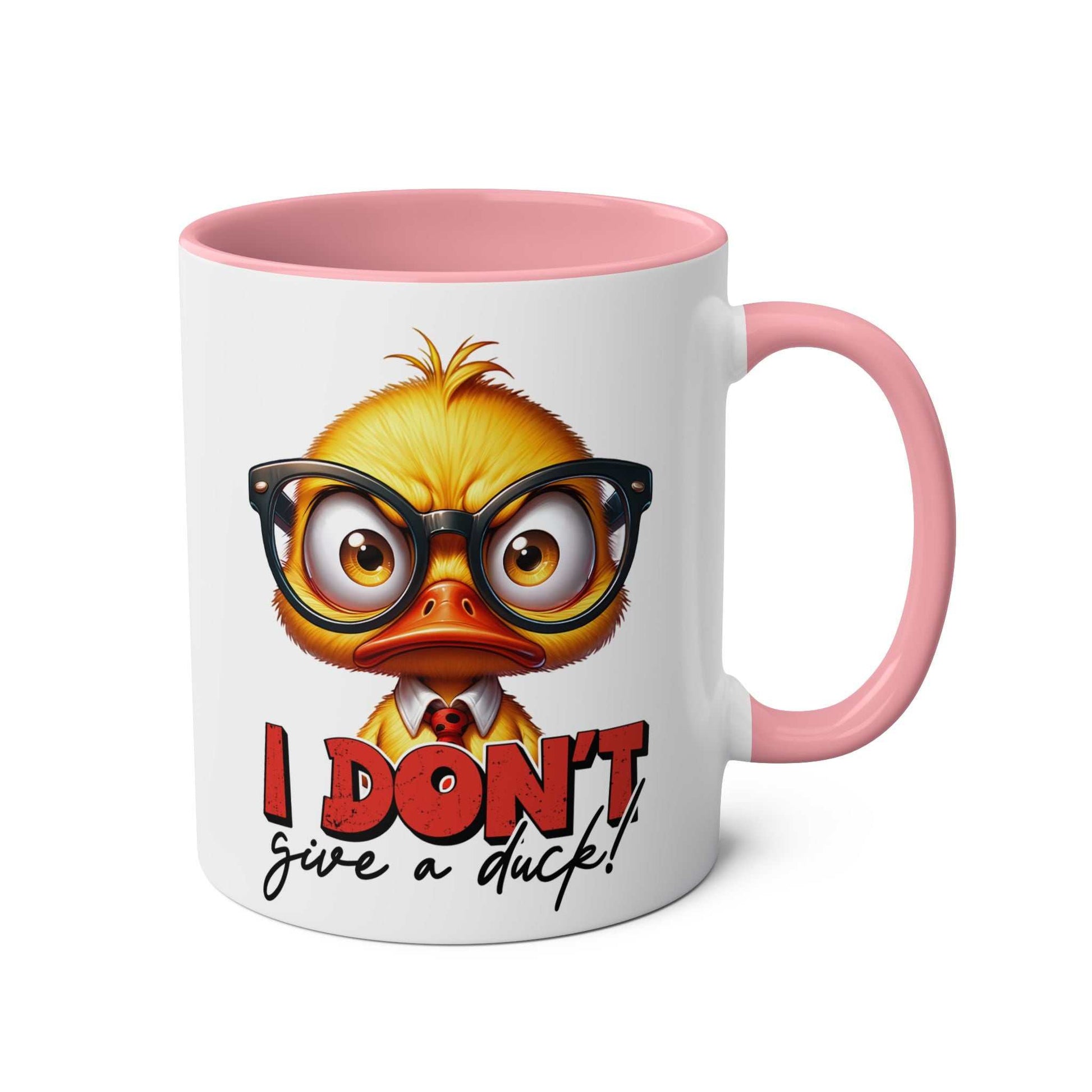 I Dont Give A Duck Coffee Mug with quirky duck design and pink handle.