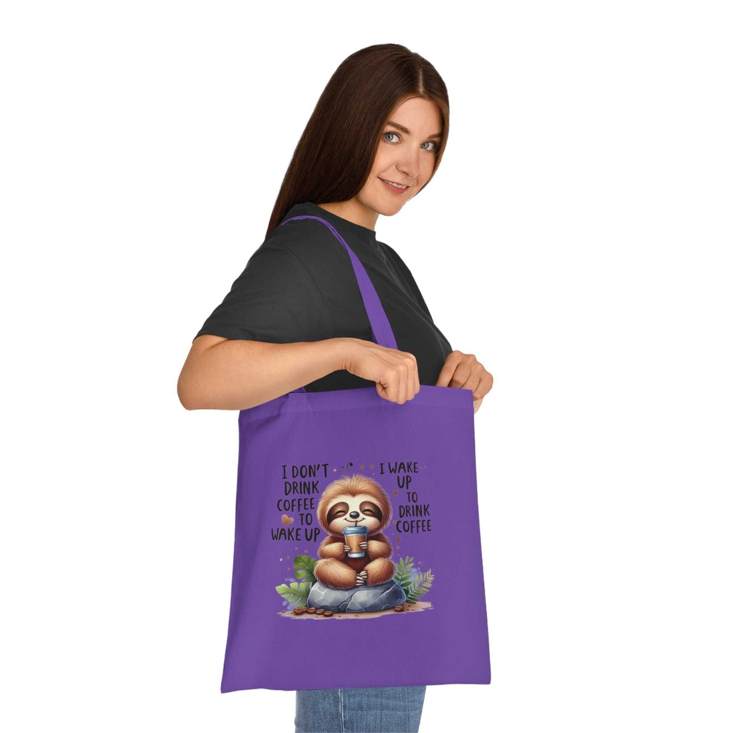 Cotton tote bag featuring a cute sloth design, perfect for carrying essentials in style.