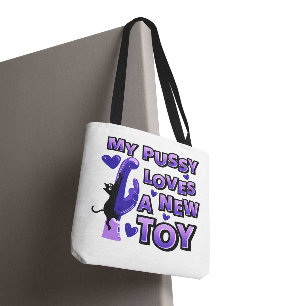 Fun cat toy tote bag with cheeky design and colorful handles
