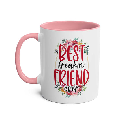 Best Freaking Friend Coffee Mug with floral design and pink handle.