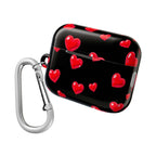 Black Hearts AirPods case with red hearts pattern and carabiner clip, durable protective hard shell for AirPods and AirPods Pro.