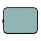 Teal green neoprene laptop sleeve with dual zipper and soft foam lining for protection