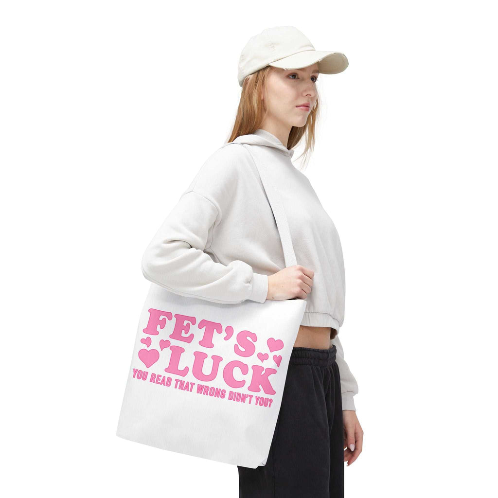 Pink heart tote bag with cheeky fun design and multiple handle colors