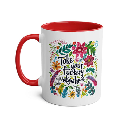 Take Your Fuckery Elsewhere coffee mug with floral design and red interior.