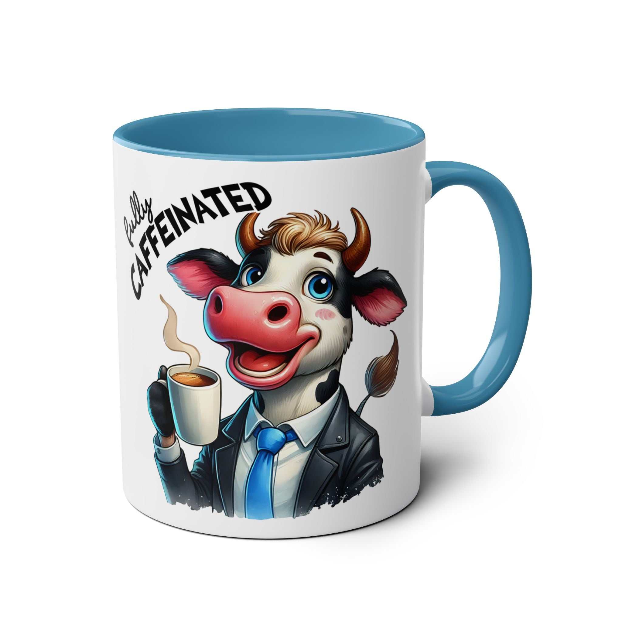 Fun Sarcastic Coffee Mug with cartoon cow design, blue handle, and text "Fully Caffeinated".