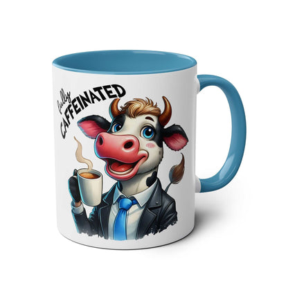 Fun Sarcastic Coffee Mug with cartoon cow design, blue handle, and text "Fully Caffeinated".