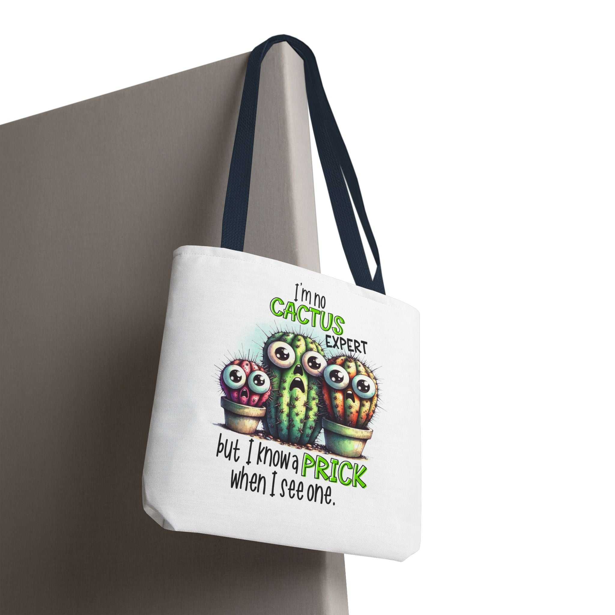 Fun cactus tote bag with cheeky design and colorful handles, available in three sizes, durable and lightweight for daily use