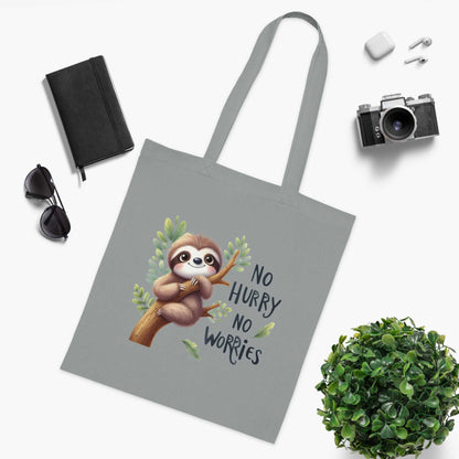 Cotton tote bag with cute sloth design, perfect for everyday use.