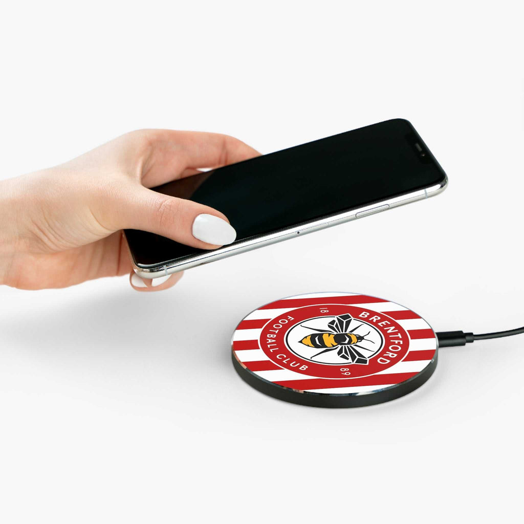 Brentford FC wireless charger with bee crest in red and white, 10W fast charging, durable aluminum casing, and 10cm diameter surface.