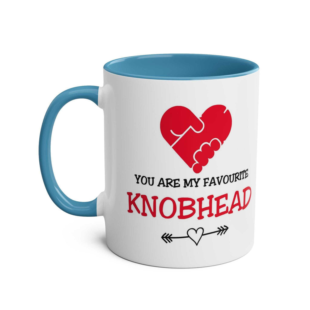 Favourite Knobhead Mug white ceramic cup with blue handle and inside featuring red heart and text design